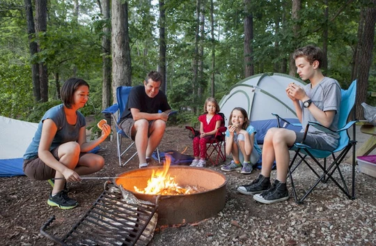 bigstock-family-of-five-people-camping-